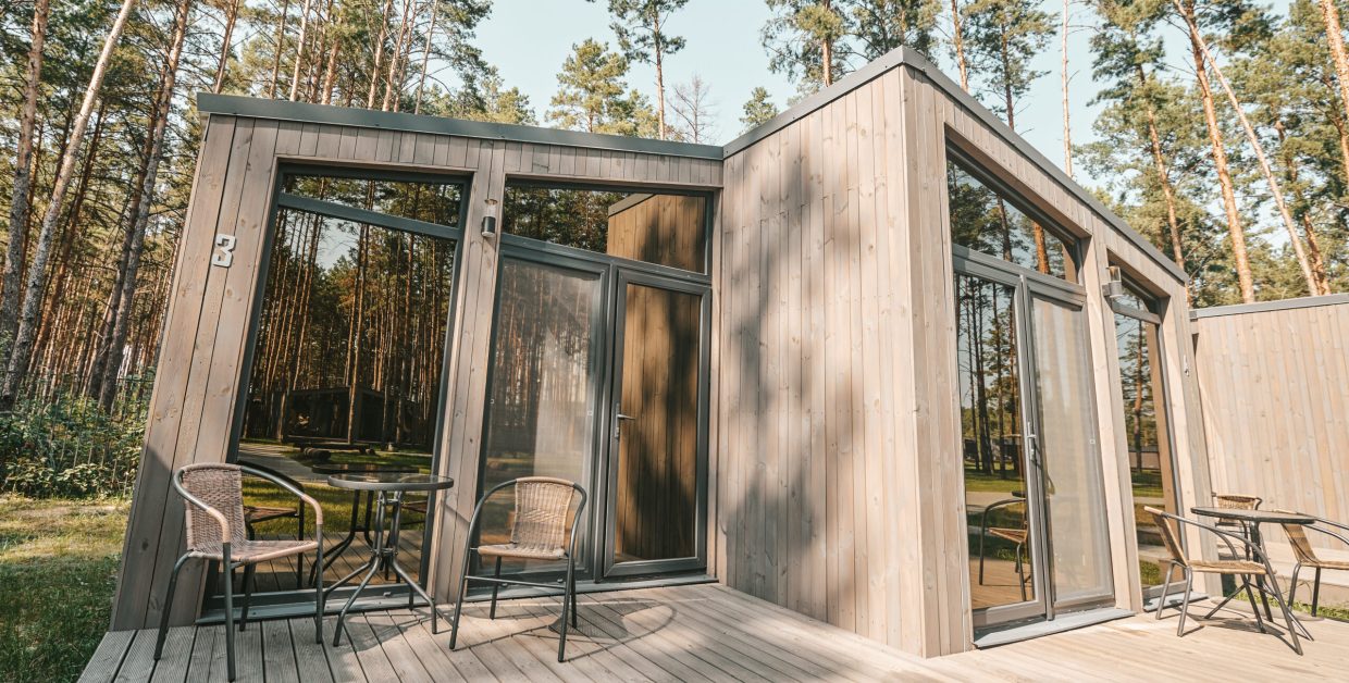 In the forest. Picture of a wooden building in the forest